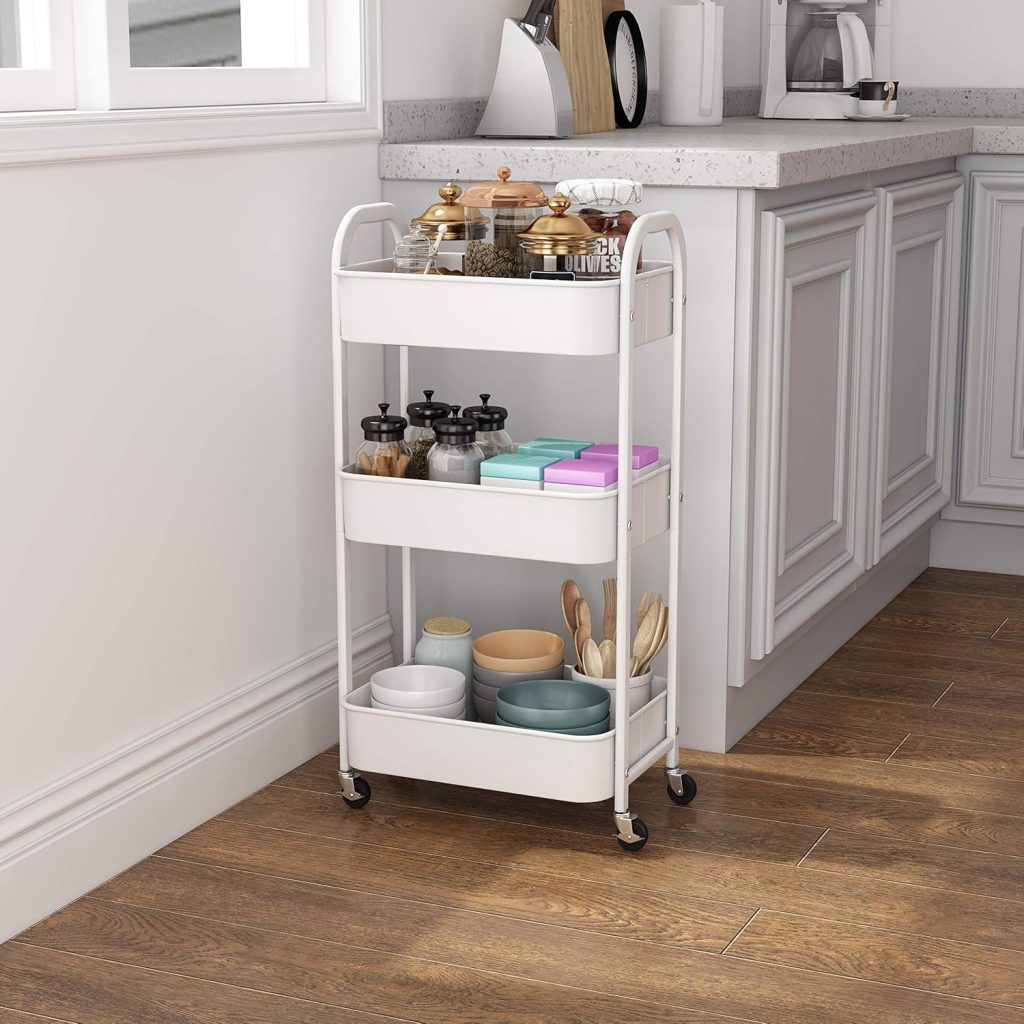 rolling storage cart being used in a kitchen and filled with utensils and different cooking supplies for easy access