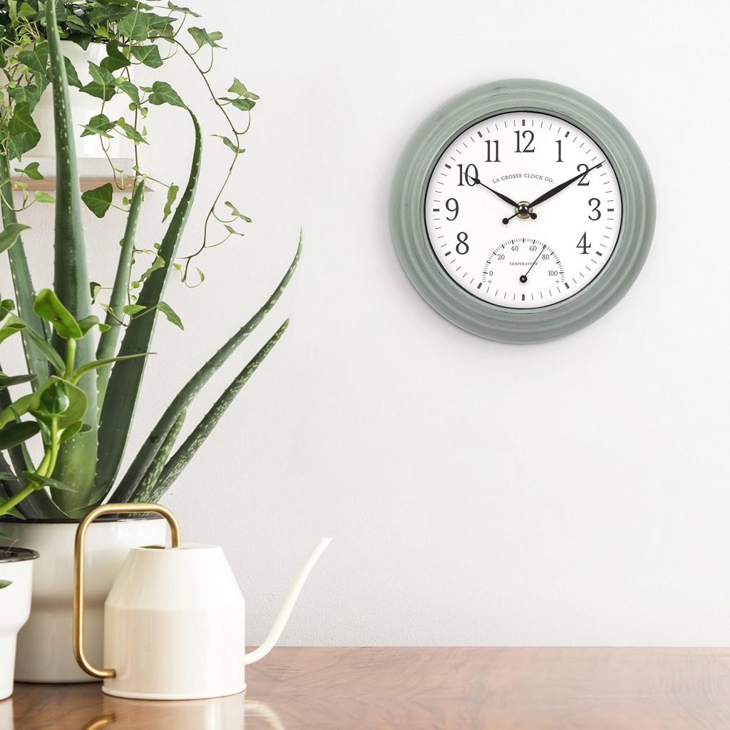 analog clock hanging on the wall