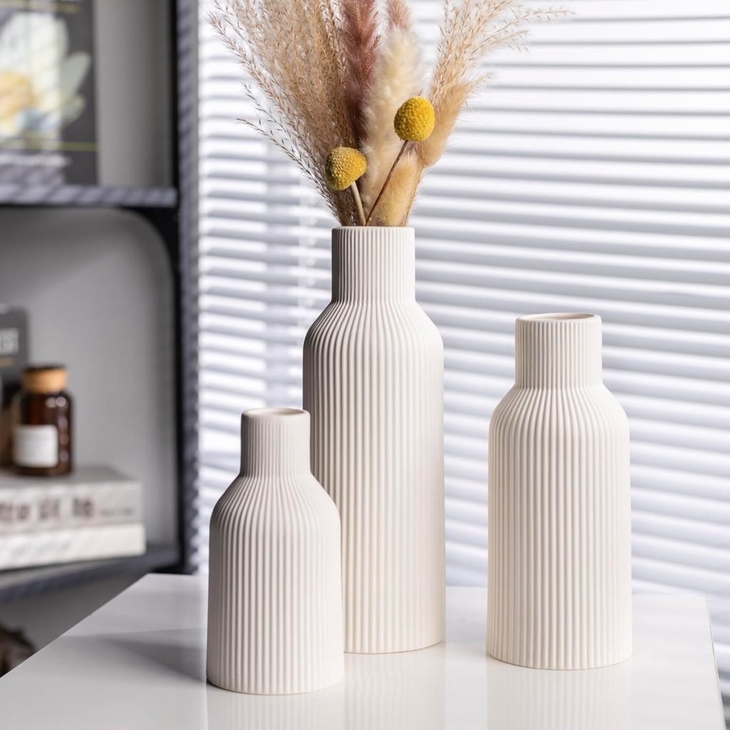 3 different sizes of fluted vases
